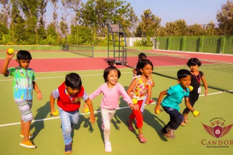 A glimpse of our K2 students playing rain ball.