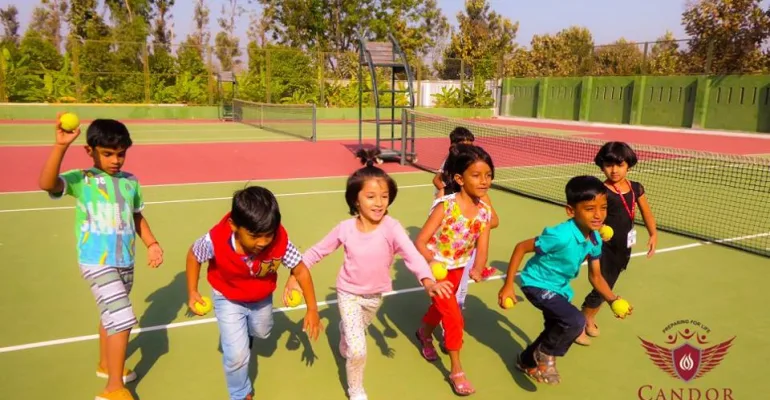 A glimpse of our K2 students playing rain ball.