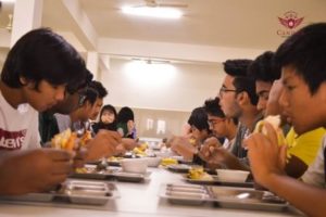 Candor boarders eating in the Dining Hall